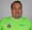 homem pardo, obeso, de camiseta verde, sorrindo.